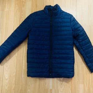Lightweight puffer jacket large, but slim.